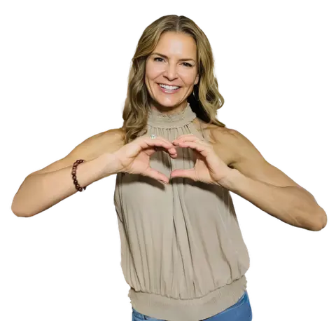 Dr. Lisa Christie making a heart gesture with her hands